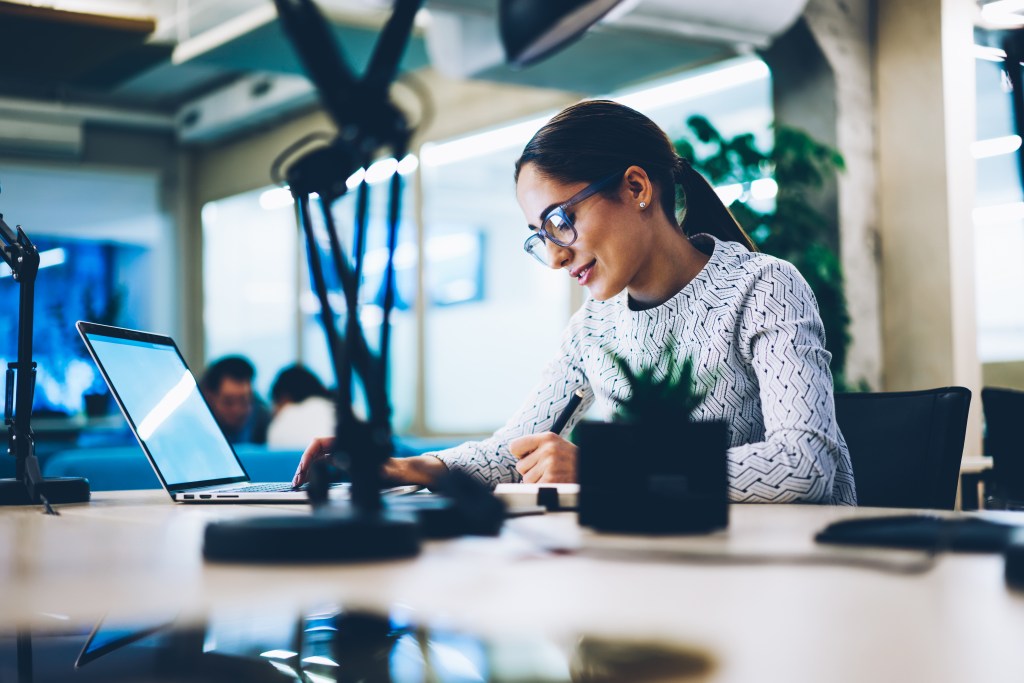 Woman working at computer in office