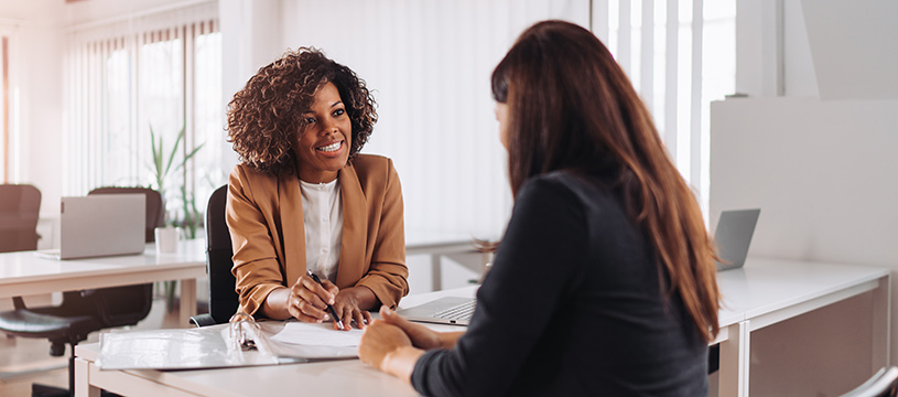 Two people in a business meeting