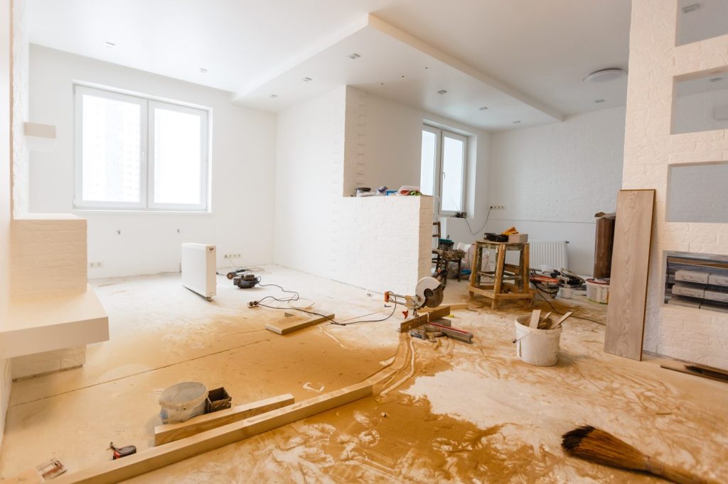 A rental property undergoing renovations to the floor and walls