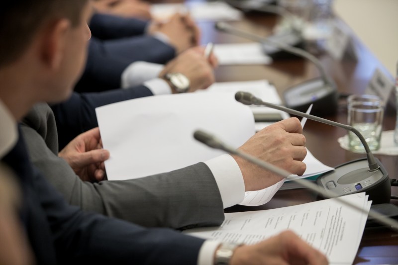 politician looking at a document