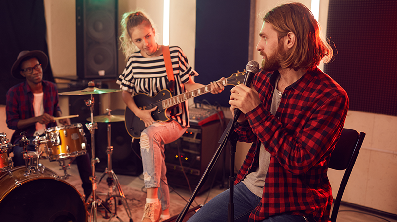 Band practising in rehearsal studio