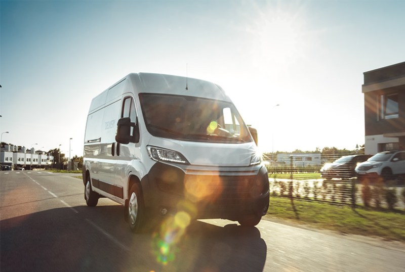 Medium-sized van driving on the road