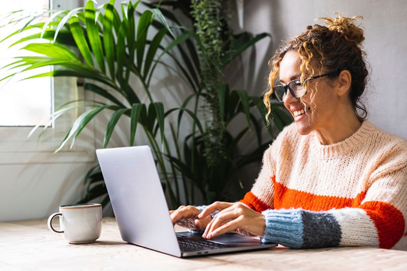 Woman business owner working on her laptop