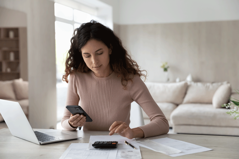 Young small business owner calculating National Insurance