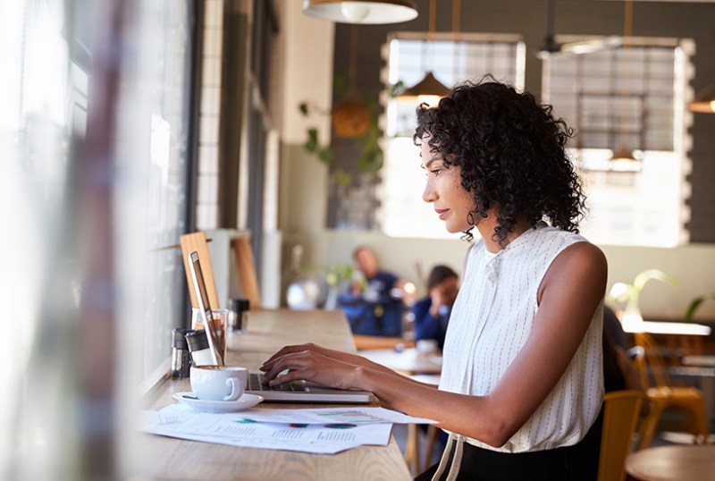 Owner of dropshipping business working in coffee shop