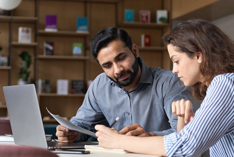 Manager and employee discussing leave of absence policy