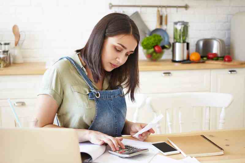 Woman working out her tax bill