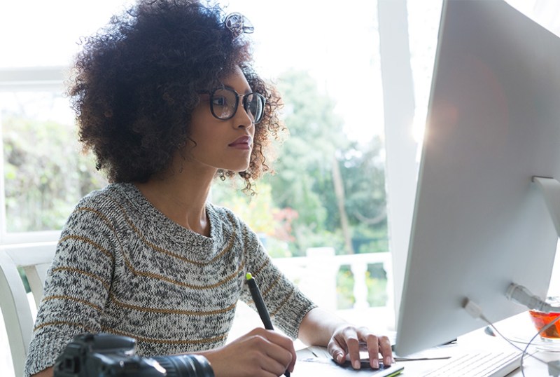 Self-employed person completing tax return