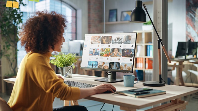 Woman in creative studio using computer