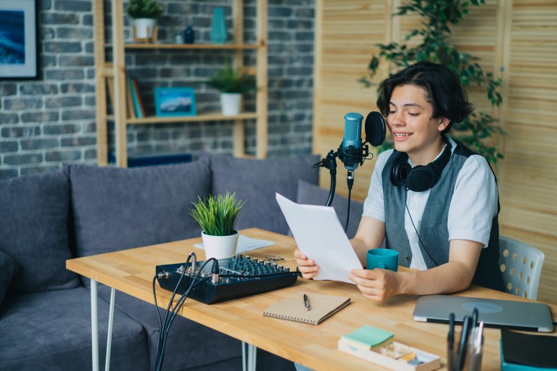 Woman recording a podcast