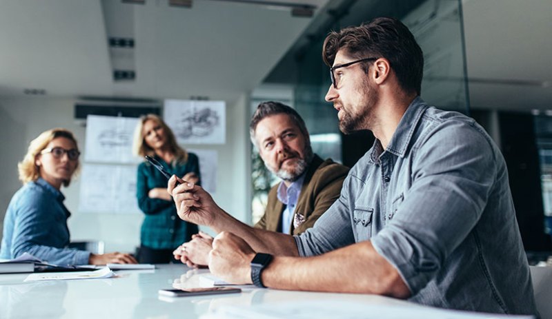 Subsidiary company shareholders in a business meeting