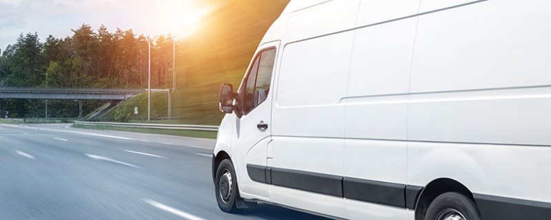 White van driving on motorway