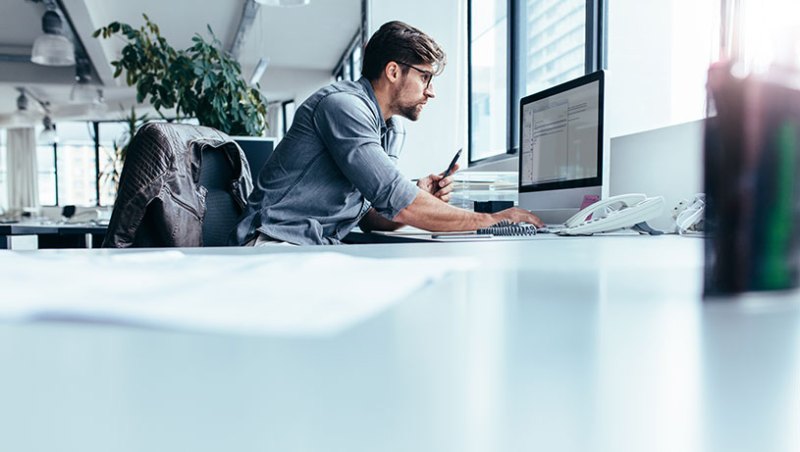 Business man working on a computer