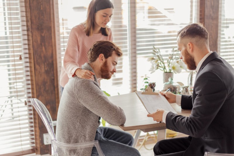 Tenants reviewing a tenancy agreement