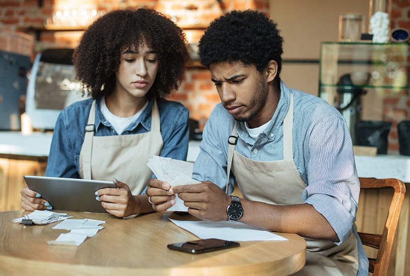 Cafe owners doing their taxes